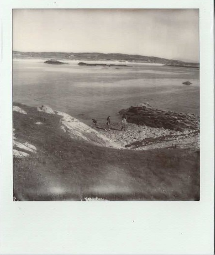 Polaroid SX-70 film photograph of an archaeological dig on the shore of Inishlyon, taken from a distance.